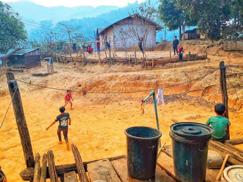 Children playing in a village in Laos